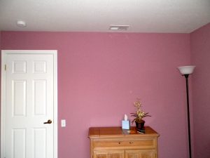Bedroom with rose pink walls